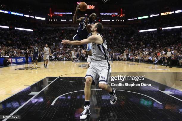 Tony Allen of the Memphis Grizzlies falls to the court after he drew a flagrant foul from Manu Ginobili of the San Antonio Spurs in the fourth...