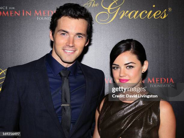 Actors Ian Harding and Lucy Hale attend the 38th Annual Gracie Awards Gala at The Beverly Hilton Hotel on May 21, 2013 in Beverly Hills, California.