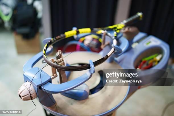 stringing the tennis racket on stringer - tennis club stock pictures, royalty-free photos & images