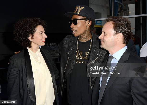 Universal Pictures Co- Chairman Donna Langley, rapper Wiz Khalifa and Universal Music publishing president Mike Knobloch arrive at the premiere of...