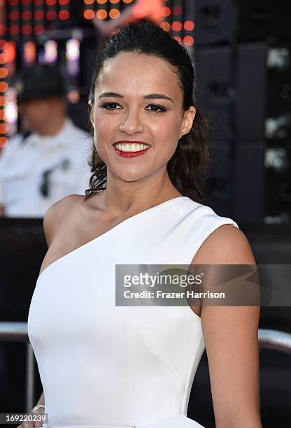 Actress Michelle Rodriguez arrives at the Premiere Of Universal Pictures' "Fast & Furious 6" on May 21, 2013 in Universal City, California.