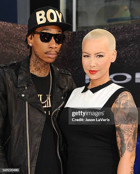 Rapper Wiz Khalifa and Amber Rose attend the premiere of "Fast & Furious 6" at Universal CityWalk on May 21, 2013 in Universal City, California.