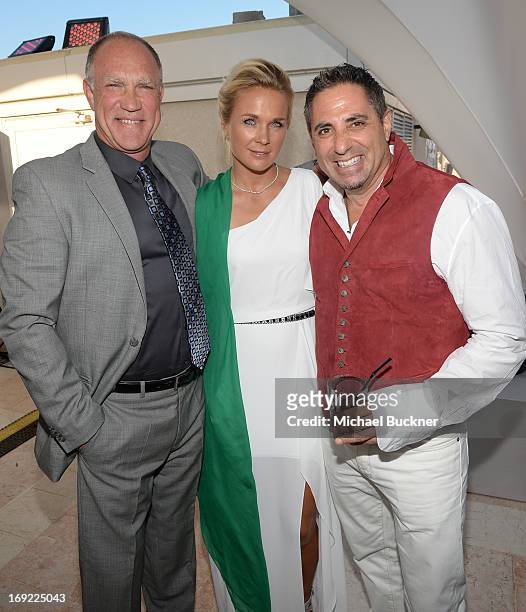 Producer Ryan Carroll, Svetlana Carroll and producer Greg Centineo attend the Summertime Entertainment's Cannes Animation Celebration Cocktail Party...