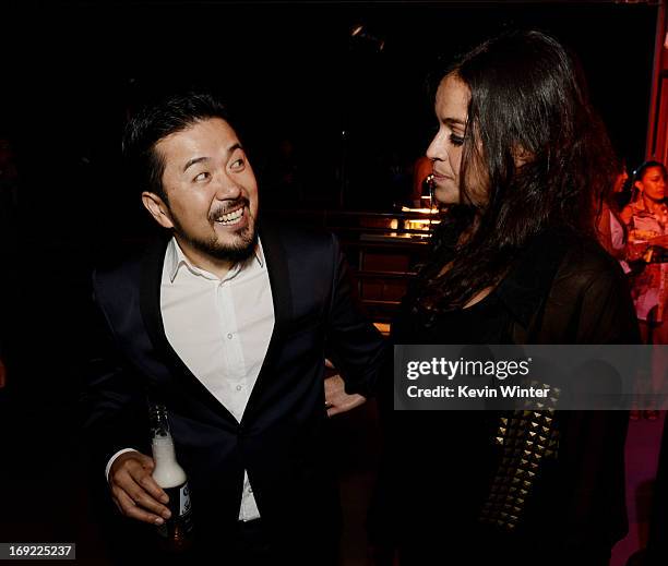 Director/executive producer Justin Lin and actress Michelle Rodriguez pose at the after party for the premiere of Universal Pictures' "Fast & Furious...