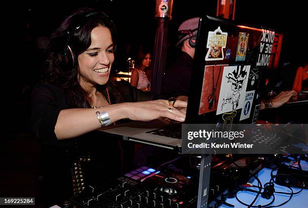 Actress Michelle Rodriguez DJ's at the after party for the premiere of Universal Pictures' "Fast & Furious 6" at the Gibson Amphitheatre on May 21,...