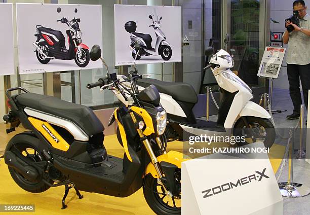 Thai-manufactured Honda new scooter Zoomer X with a 110 cc engine is displayed at a press preview in Tokyo on May 22, 2013. Honda Motor announced on...