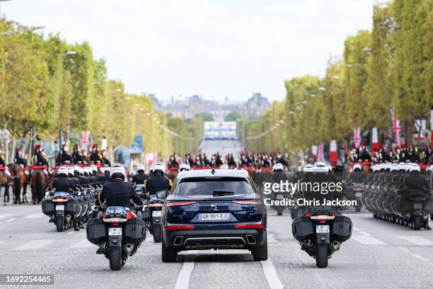The Presidential convoy departs after a ceremonial welcome at The Arc De Triomphe for King Charles III And Queen Camilla on September 20, 2023 in...