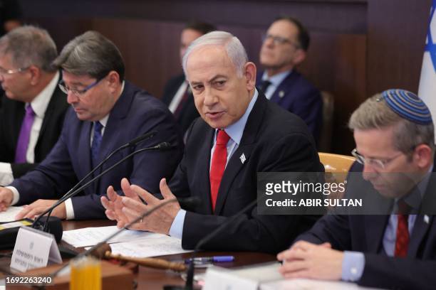 Israeli Prime Minister Benjamin Netanyahu attends the weekly cabinet meeting at his office in Jerusalem on September 27, 2023.