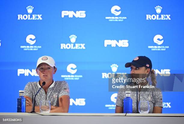 Stacy Lewis, captain of Team USA and assistant Natalie Gulbis talk with the media during a press conference prior to the The Solheim Cup at Finca...