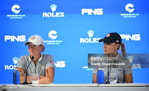 Stacy Lewis, captain of Team USA and assistant Natalie Gulbis talk with the media during a press conference prior to the The Solheim Cup at Finca...