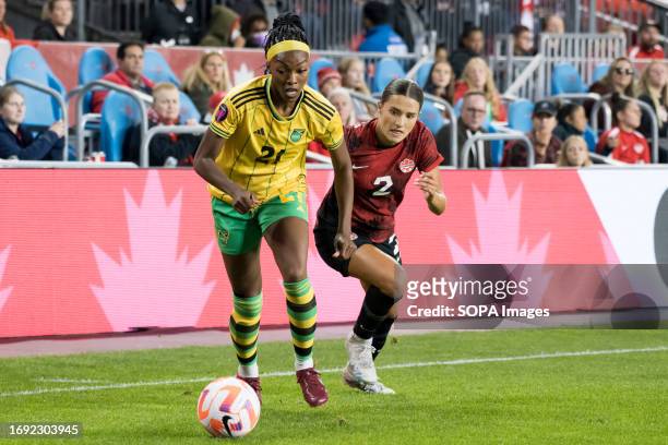 Sydney Collins and Cheyna Williams in action during the CONCACAF Women's Championship 2024 Olympic qualifier between Canada and Jamaica at BMO field...
