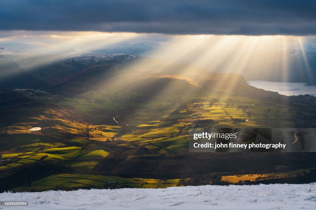 View from Blencathra bathed in sunrays. Lake District National park. UK. Europe.