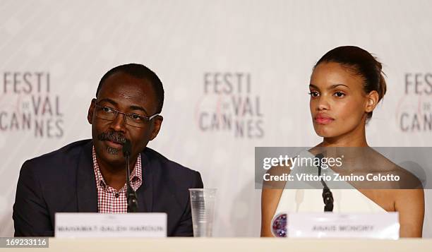 Director Mahamat Saleh Haroun and actress Anais Monory attend the 'Grigris' Press Conference during the 66th Annual Cannes Film Festival at the...