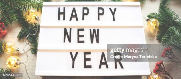 lightbox with inscription happy new year. christmas. festive background. - new years eve 2020 stock pictures, royalty-free photos & images