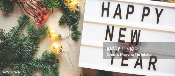 lightbox with inscription happy new year. christmas. festive background. - new years eve 2020 stock pictures, royalty-free photos & images