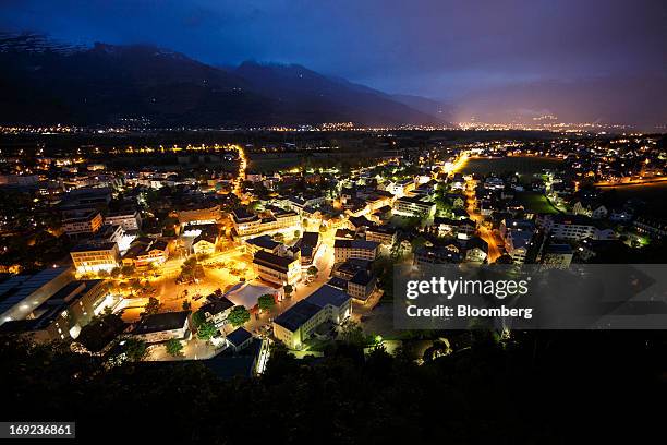 Lights illuminate roads and buildings at night in the city of Vaduz, Liechtenstein, on Monday, May 20, 2013. Liechtenstein, an alpine principality...