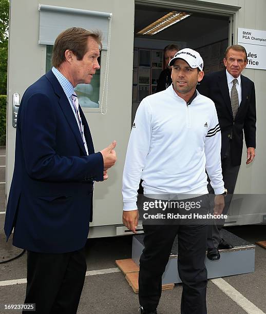 Sergio Garcia of Spain emerges from a meeting in the rules office with George O'Grady, Chief Executive of the European Tour and Tim Finchem, PGA Tour...