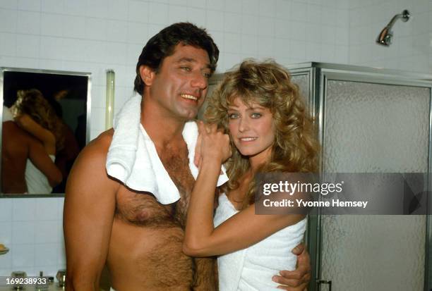 Joe Namath and Farrah Fawcett tape a Noxzema shaving cream commercial December 4, 1981 in New York City.