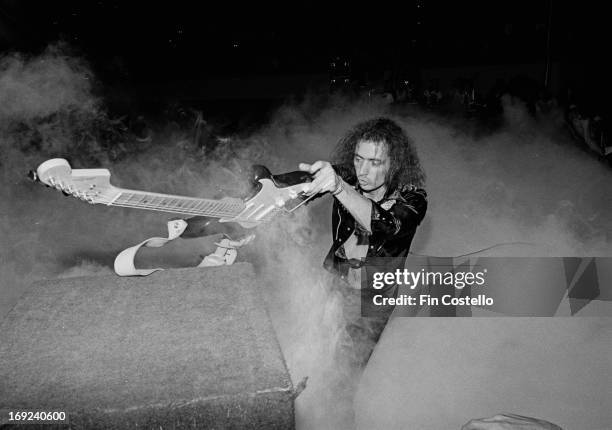 1st NOVEMBER: Guitarist Ritchie Blackmore from Deep Purple performs live on stage holding his fender stratocaster above a monitor during the band's...