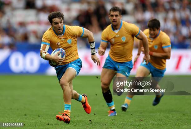 Felipe Etcheverry of Uruguay breaks with the ball during the Rugby World Cup France 2023 match between Italy and Uruguay at Stade de Nice on...
