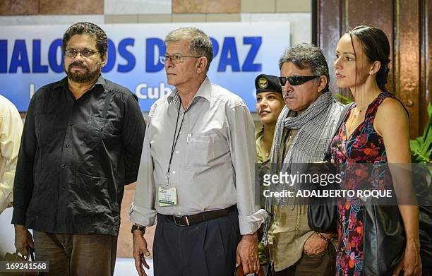 Commanders Ivan Marquez , Rodrigo Granda and Jesus Santrich , FARC members Tanja Neijmeier and Maritza Garcia arrive on May 22, 2013 at Convention...
