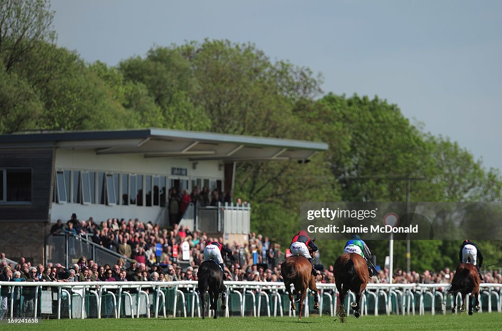 Isc Huntingdon Horses and jockeys race past the Huntingdon Grand stand during racing ...
