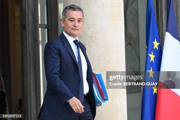 French Interior Minister Gerald Darmanin leaves after the weekly cabinet meeting at the presidential Elysee Palace in Paris, on September 27, 2023.