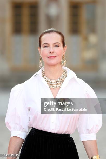 Carole Bouquet arrives at the Palace of Versailles ahead of the State Dinner held in honor of King Charles III and Queen Camilla in the Hall of...