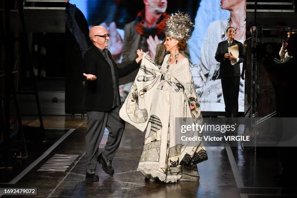 Fashion designer Antonio Marras and Marisa Berenson walk the runway during the Antonio Marras Ready to Wear Spring/Summer 2024 fashion show as part...