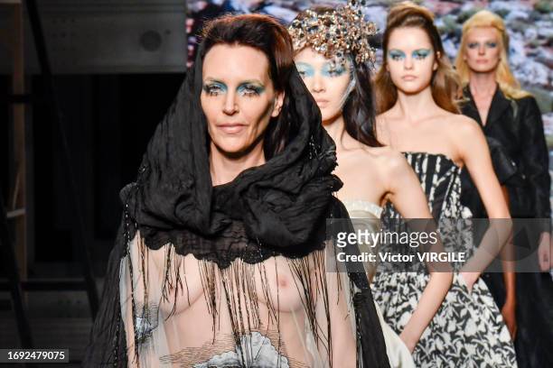 Hannelore Knuts walks the runway during the Antonio Marras Ready to Wear Spring/Summer 2024 fashion show as part of the Milan Fashion Week on...