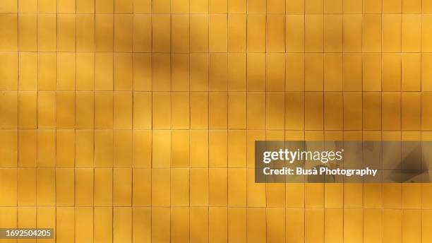 colorful yellow wall tiles - yellow tiles stock pictures, royalty-free photos & images
