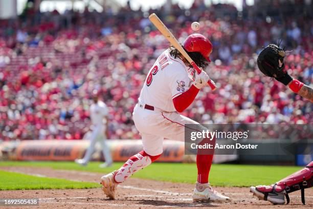 Jonathan India of the Cincinnati Reds reacts to being hit by a pitch in the third inning against the Minnesota Twins at Great American Ball Park on...