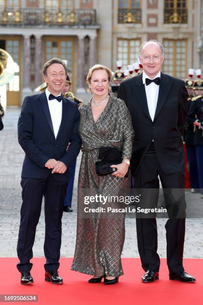 Stéphane Bern, Laurence de Gaulle and Yves de Gaulle arrive at the Palace of Versailles ahead of the State Dinner held in honor of King Charles III...