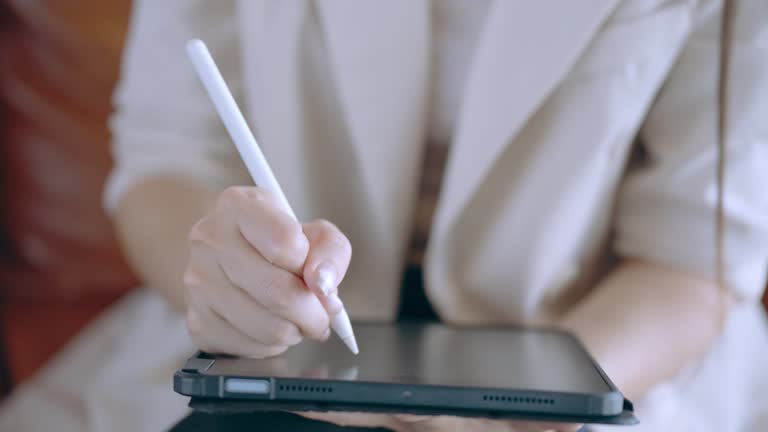 Notes Touchpad Asia freelance Asian businesswoman or female boss using a digital ...
