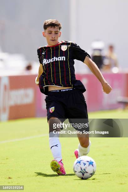 Matteo Escouflaire of RC Lens passes the ball during the UEFA Youth League 2023/24 match between Sevilla FC and RC Lens at Ramon Cisneros Palacios...