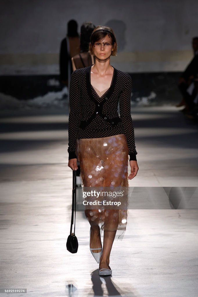 A model walks the runway at the N°21 fashion show during the Milan