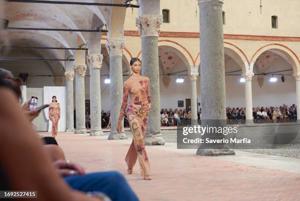 Models walk during the Alberta Ferretti fashion show during the Milan Fashion Week Womenswear Spring/Summer 2024 on September 20, 2023 in Milan,...