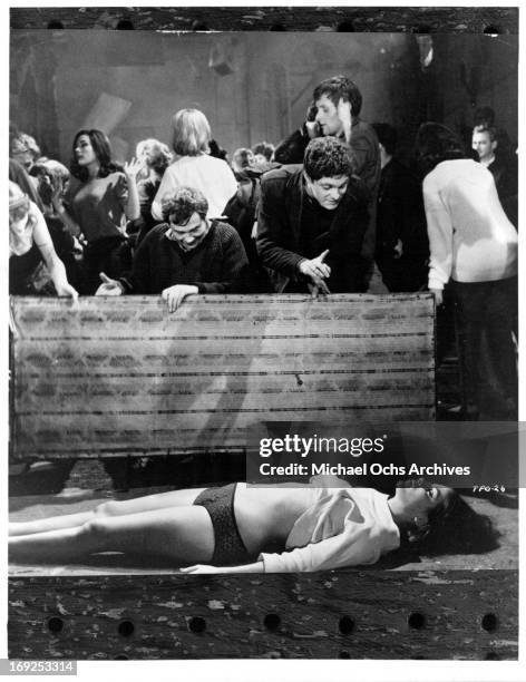 Louise Sorel lies motionless in a scene from the film 'The Party's Over', 1965. (Photo by Allied Artists/Getty Images