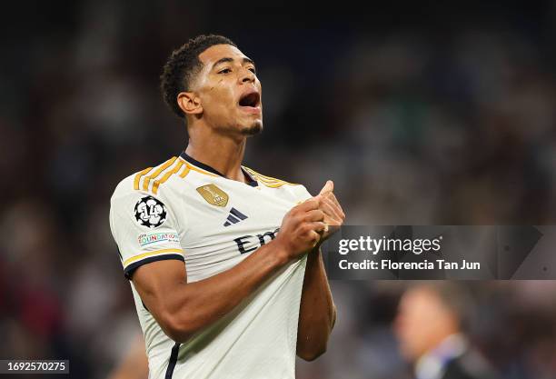 Jude Bellingham of Real Madrid celebrates after scoring their sides first goal during the UEFA Champions League match between Real Madrid CF and 1....