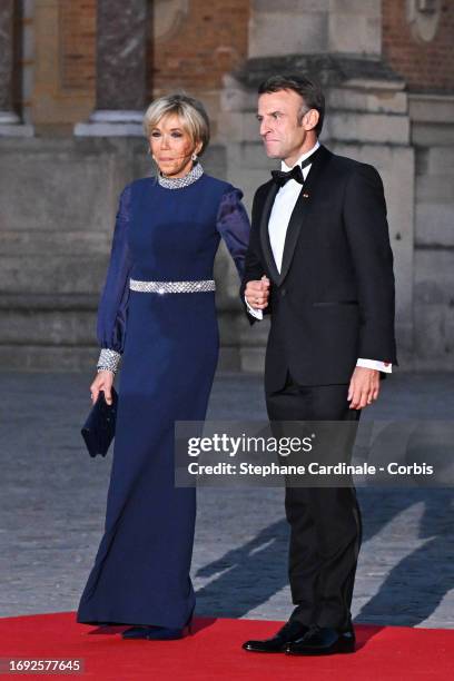 President of France Emmanuel Macron and Brigitte Macron arrive at the Palace of Versailles ahead of the State Dinner held in honor of King Charles...