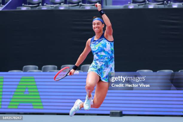 Caroline Garcia of France celebrates victory after the women's singles round of 16 match against Hailey Baptiste of United States as part of the day...