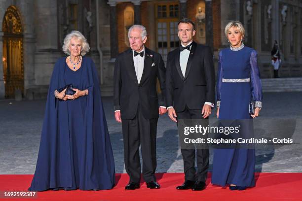 Queen Camilla, King Charles III, President of France Emmanuel Macron and Brigitte Macron arrive at the Palace of Versailles ahead of the State Dinner...