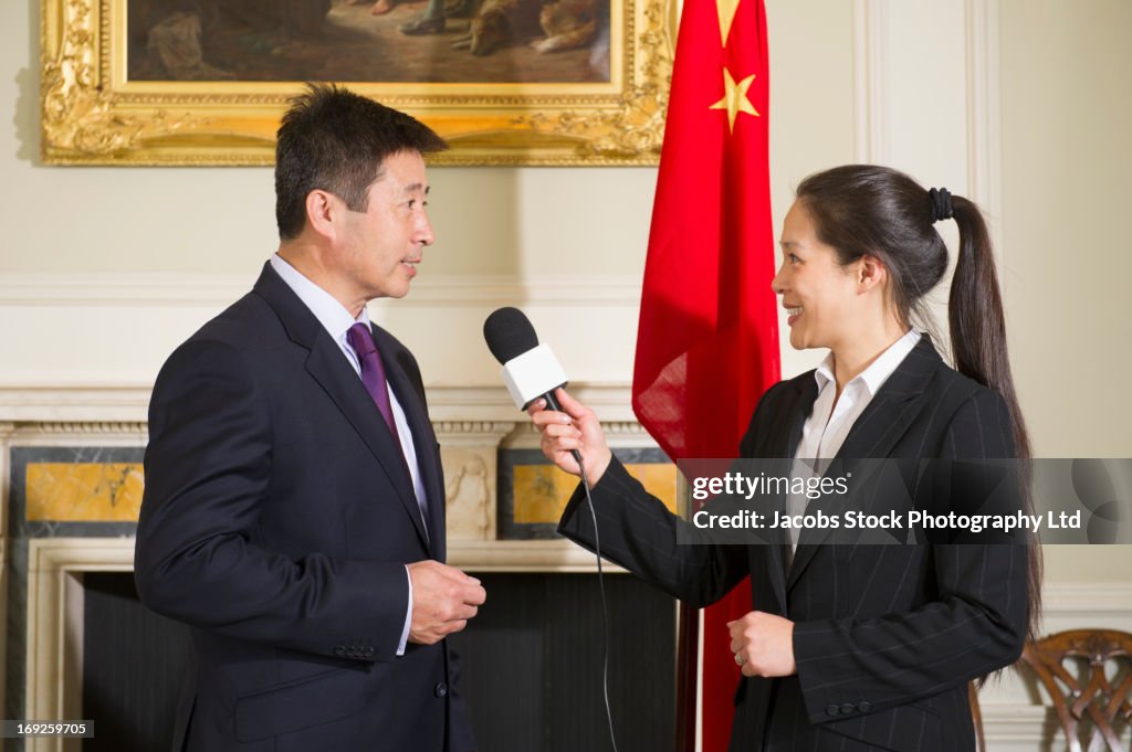 Chinese Interviewer Chinese Businessman Giving Interview High-Res Stock Photo - Getty Images
