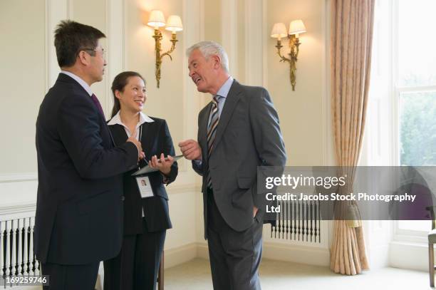 business people talking in meeting - social ambassador stock pictures, royalty-free photos & images
