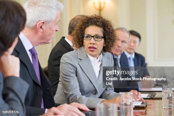 business people talking in meeting - overheid stockfoto's en -beelden