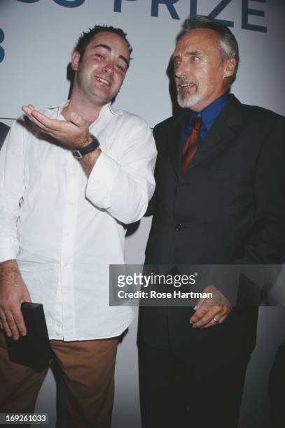 Scottish artist Douglas Gordon with actor Dennis Hopper at the Hugo Boss Prize ceremony being held at the Guggenheim Museum, New York City. Gordon is...