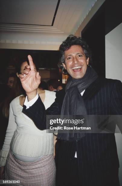 Valentino PR director, Carlos Souza, at Valentino's cocktail party at Bergdorf Goodman, New York City, 2004.