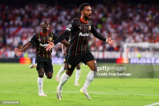 Angelo Fulgini of RC Lens celebrates after scoring the team's first goal during the UEFA Champions League match between Sevilla FC and RC Lens at...