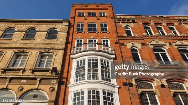 brick facades of old buildings uk - leicester stock pictures, royalty-free photos & images