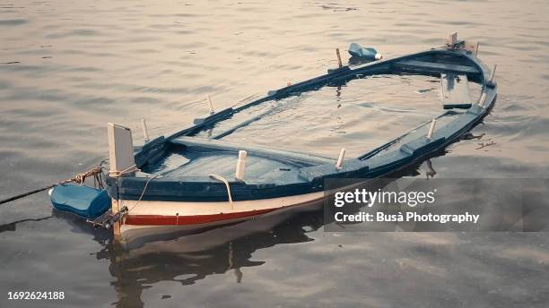 sinking boat - boat ruins stock pictures, royalty-free photos & images